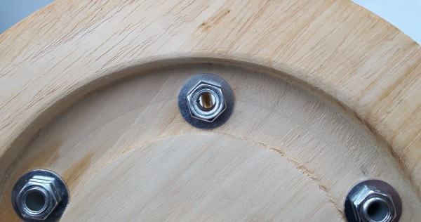 Round hardwood 6 hook pattress manufactured from Iroko 220mm