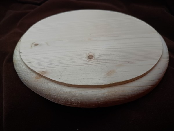 Large round softwood pattress manufactured from pine 