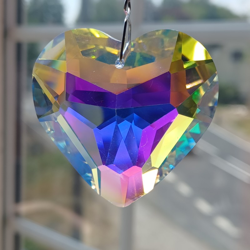 Crystal heart sun catcher on a silver coloured hanging chain