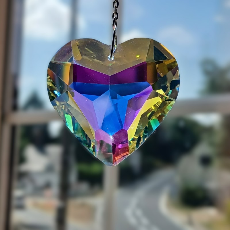 Crystal heart sun catcher on a silver coloured hanging chain