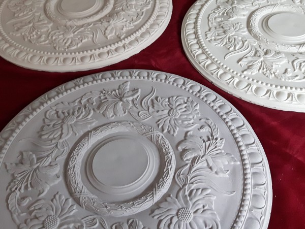 Plaster ceiling rose with flower pattern