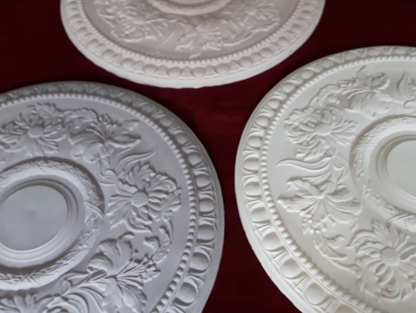 Plaster ceiling rose with flower pattern